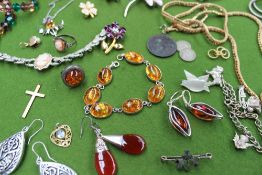 A silver and amber bead necklace, together with assorted cufflinks, brooches,