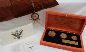 An Indian Chief Gold coin set by the United States Mint, including a 2 1/2$, 5$ and 10$ coin,