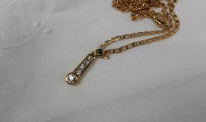 A diamond pendant, set with five round old cut diamonds to a yellow metal setting,