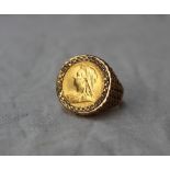 A late Victorian half sovereign dated 1900, in a 9ct gold textured ring setting, approximately 10.