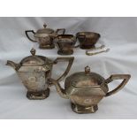 A Chinese white metal seven piece tea set, comprising a hot water pot, teapot, cream jug,