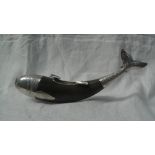 A white metal and horn ashtray in the form of a fish,