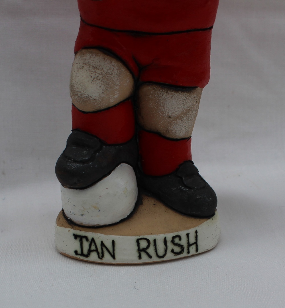 A John Hughes pottery Grogg of Ian Rush, with arms folded and foot raised on a football, - Image 2 of 5