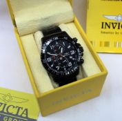 A gentleman's Invicta wristwatch, with a black dial, Arabic numerals and batons,