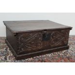 A 17th century carved oak bible box,