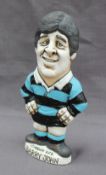 A John Hughes pottery Grogg of Barry John in a Cardiff RFC Jersey and number 10 on the reverse,