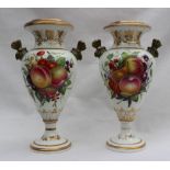 A pair of Swansea vases of flared urn shape with a gilt rim, gilt anthemions and butterfly handles,