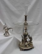 An electroplated table centrepiece with an engraved glass trumpet above a shallow glass dish,