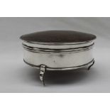 A George V silver trinket box of circular form with a faded tortoiseshell lid, London, 1917,