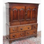 An 18th century oak mule chest,