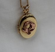 A 9ct Clogau gold locket with a tree of life motif, on a yellow gold chain, approximately 9.