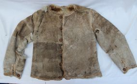 A German World War II Eastern front rabbit fur lined jacket with military stamp to the lining and