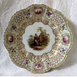 A 19th century Meissen porcelain plate with a raised moulded border with honeycomb pattern