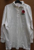An England Rugby Jersey from the 1976 Grand Slam - with a number 13 to the reverse and embroidered