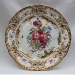 A Nantgarw porcelain plate with a raised gilt border,
