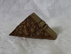 An oriental yellow metal box, of triangular form cast with starfish and shells, 6.