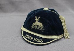 A cap and jersey belonging to the Glamorgan player Stan Trick,
