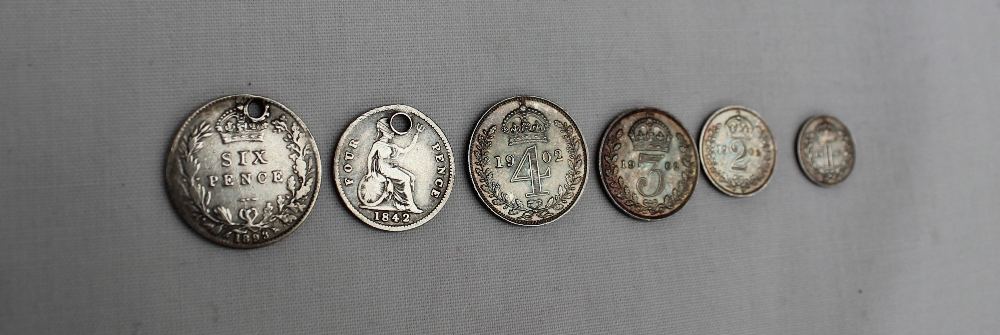 An Edwardian VII 1902 Maundy set together with a Victorian six pence dated 1893 and a four pence - Image 2 of 2