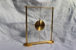 A Jaeger-Le Coultre perspex and gilt metal eight day mantle clock of rectangular form,