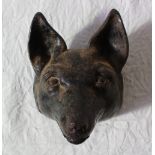 A cast iron door stop in the form of a Fox's head,