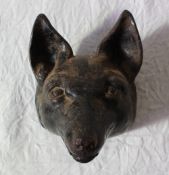 A cast iron door stop in the form of a Fox's head,