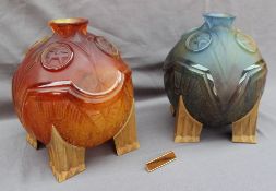 A pair of Daum "Salammbô" vases for night and day in moulded thick glass in purple and amber on