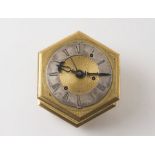 HORIZONTAL HEXIGONAL TABLE CLOCK - SEBASTIAN DRESLER / Around 1750, Bohemia, Prague Brass, fire-