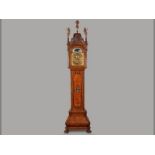 AN 18TH CENTURY DUTCH BURR WALNUT LONGCASE CLOCK BY H. BRAMER, AMSTERDAM the arched pediment with