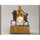 "A 19TH CENTURY GILT AND PATINATED BRASS AND ORMOLU FIGURAL MANTEL CLOCK depicting a lady on