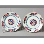 A PAIR OF 18TH CENTURY CHINESE EXPORT PLATES Circa 1725, of lobed form, decorated with famille