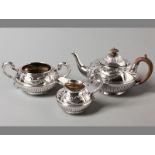 A THREE PIECE VICTORIAN SILVER TEASET LONDON 1866, C.B. comprising of a teapot, creamer and sugar