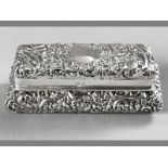 AN EDWARDIAN SILVER TRINKET BOX, BIRMINGHAM 1901, HILLIARD & THOMASON, of rectangular form, hinged