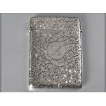 A VICTORIAN SILVER CARD CASE, BIRMINGHAM 1900, L.B. & M, hinged cover, body profusely engraved