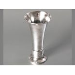 A GEORGE V SILVER VASE, BIRMINGHAM 1924, A.E. JONES, of fluted form, on a raised circular base, 14cm