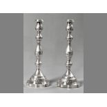 A PAIR OF GEORGE V SILVER SHABBAT CANDLESTICKS, LONDON 1934, M.S., removable wax pans, knopped