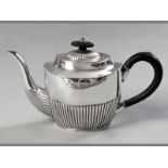 A GEORGE V SILVER TEA POT, SHEFFIELD 1919, MAPPIN & WEBB, hinged cover with removable fruitwood