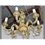 A SIX-LIGHT CAST BRASS CHANDELIER