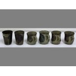 A SET OF SIX ASSORTED RORKESDRIFT POTTERY GOBLETS BY ENVAL MBATHA & OTHERS