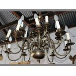 A 14-BRANCH BRASS CHANDELIER