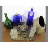 A COLLECTION OF VARIOUS GLASS BOTTLES & VASES