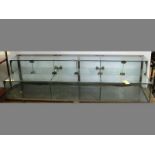 A SET OF GLASS SHOP-FITTING SHELVES, 39 by 149 by 45cm