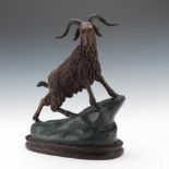 After Jules Moigniez 16-1/2" x 12-5/8" x 6-5/8"Cast metal sculpture of a goat on a rocky