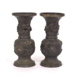 A Pair of Bronze Vases 21-1/4" x 10-1/4"Two bronze vases, of bulbous form with an elongated, tapered