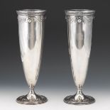 A Pair of Tiffany and Co. Sterling Silver Vases, Dated 1915 13-7/8" x 4-3/4"Flared rim tapering to a