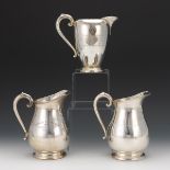 Three Preisner Sterling Silver Trophy Pitchers, ca. Mid 20th Century nullThree scroll-handled