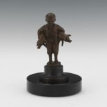 Bronze Figurine of a Young Boy Holding Two Piglets