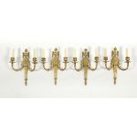 Four Bronze Neoclassical Wall Sconces