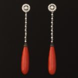 A Pair of Coral, White and Black Diamond Earrings