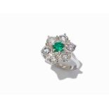 Emerald Ring with Flower-Shaped Diamond Border, 18K White Gold 18 karat white goldHallmarked with