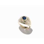 Lady’s Ring with a Central Sapphire and 28 Diamonds, 14K Gold 14 karat yellow goldEurope, 20th